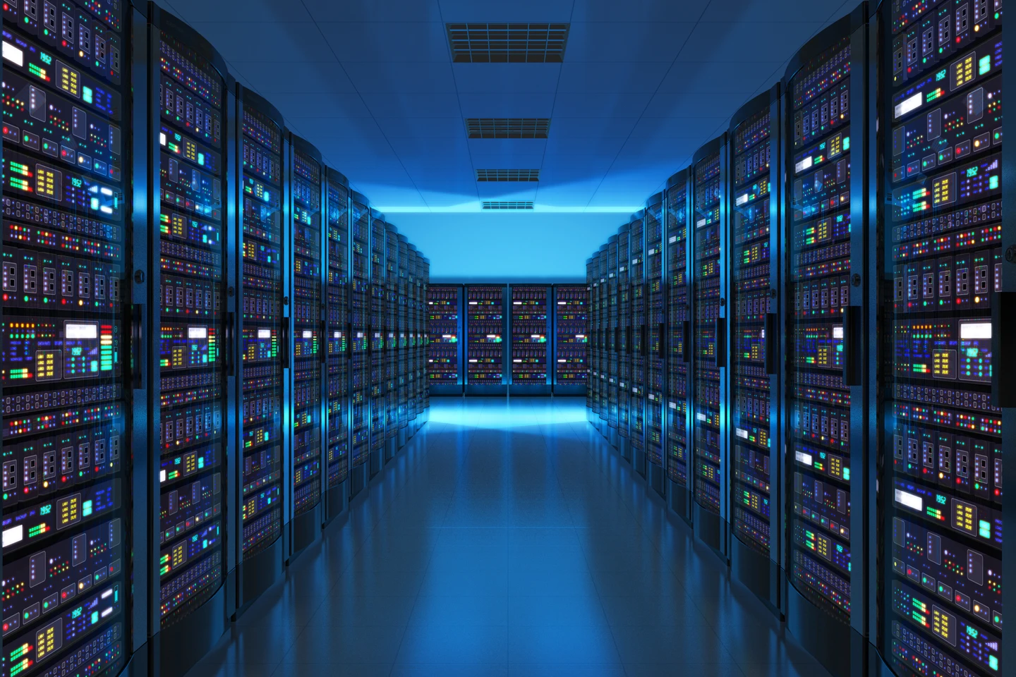 Wide angle of server room in a data center.